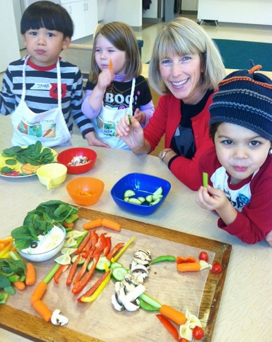Kids cooking green via LizsHealthyTable.com Kids cooking green via LizsHealthyTable.com