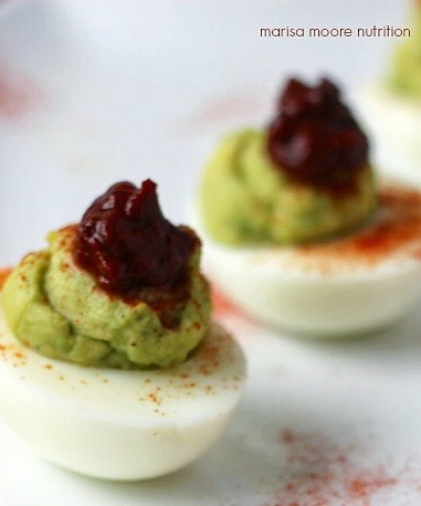 Harissa Avocado Deviled Eggs via LizsHealthyTable.com