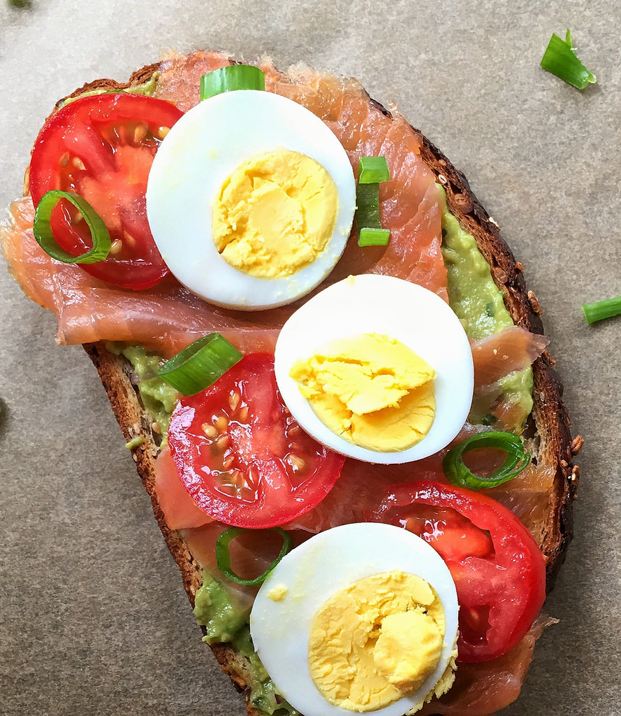 Avocado Toast with Smoked Salmon, Tomato, and Egg via LizsHealthyTable.com Avocado Toast with Smoked Salmon, Tomato, and Egg via LizsHealthyTable.com