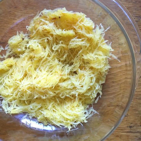 Cheesy Broccoli-Stuffed Spaghetti Squash Bowls via lizshealthytable.com #vegetarian