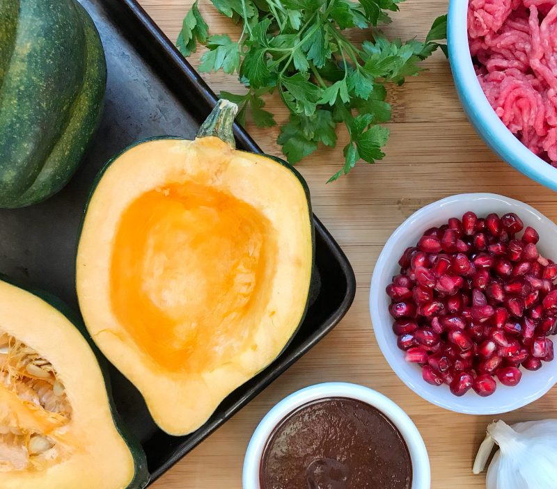 Roasted Acorn Squash with BBQ Beef & Pomegranate Arils via LizsHealthyTable.com #dinner #WinterSquash #GlutenFree