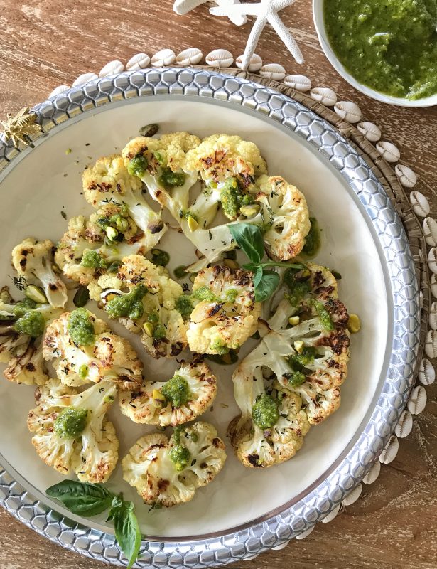 Roasted Cauliflower Steaks with Pistachio Pesto via LizsHealthyTable.com #vegetarian
