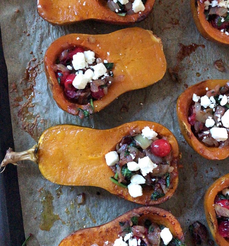 Honeynut Squash Stuffed with Caramelized Onion, Cranberries, Spinach and Bacon via LizsHealthyTable.com