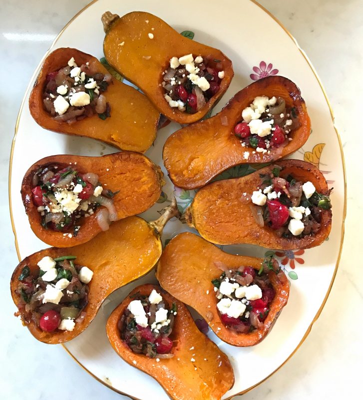 Honeynut Squash Stuffed with Caramelized Onion, Cranberries, Spinach and Bacon via LizsHealthyTable.com