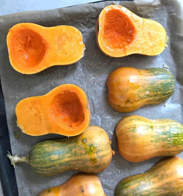 Honeynut Squash Stuffed with Caramelized Onion, Cranberries, Spinach and Bacon via LizsHealthyTable.com