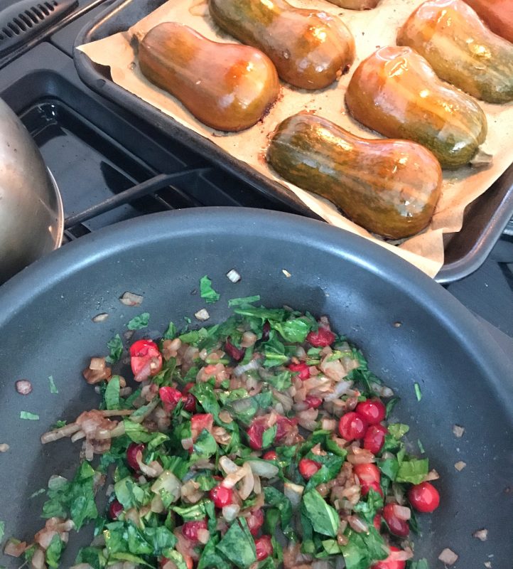 Honeynut Squash Stuffed with Caramelized Onion, Cranberries, Spinach and Bacon via LizsHealthyTable.com