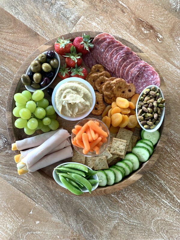 How to make a kid-friendly snack board via lizshealthytable.com #snackboard