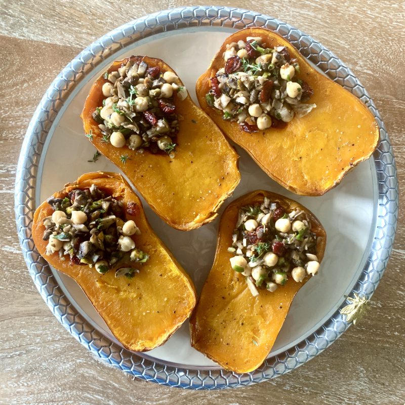 Honeynut Squash Stuffed with Mushrooms, Chickpeas, Pistachios & Cranberries via LizsHealthyTable.com #vegan #vegetarian