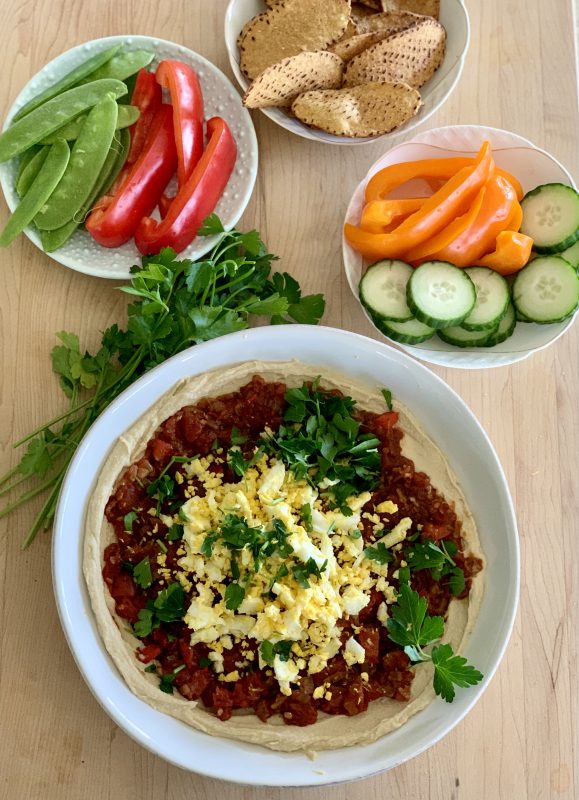 Hummus Shakshuka Snack Bowl with Veggies and Sweet Potato Chips via LizsHealthyTable.com