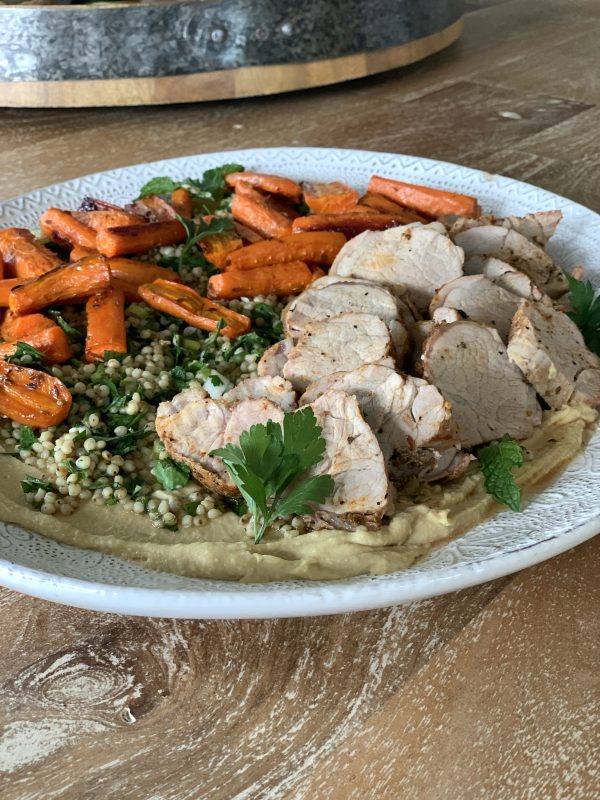 Roasted Pork Tenderloin with Chickpea Hummus, Herbed Sorghum, and Cumin-Honey Carrots via lizshealthytable.com